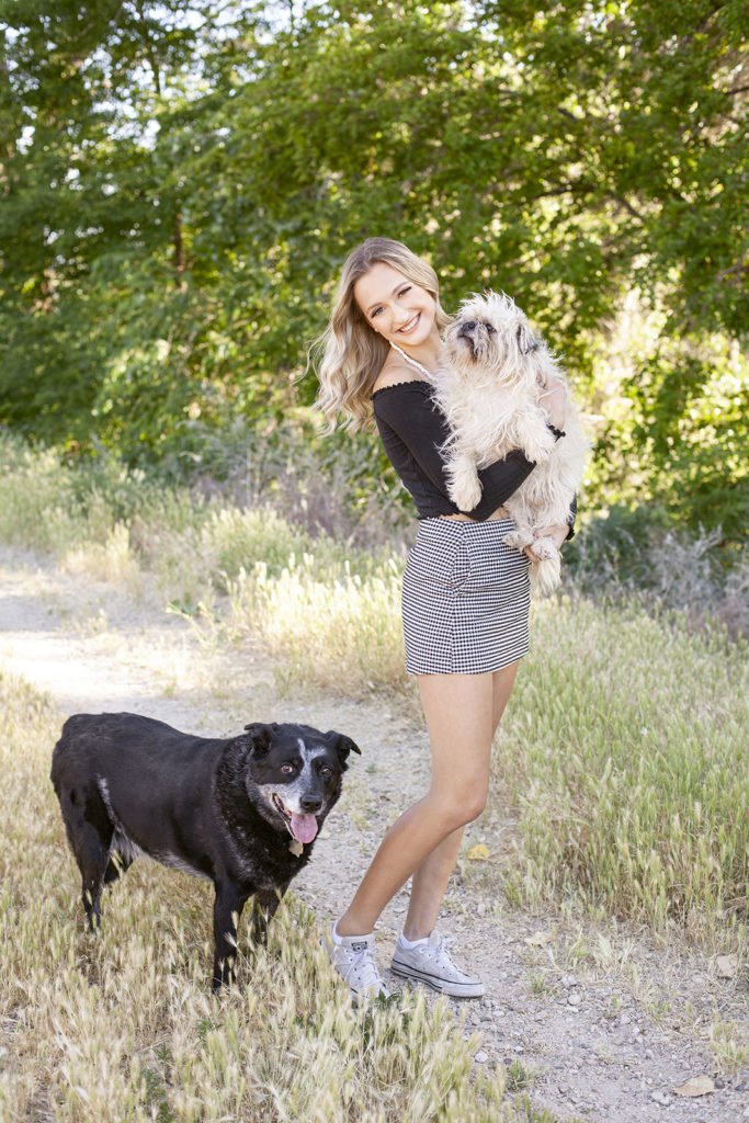 senior girl with her two dogs
